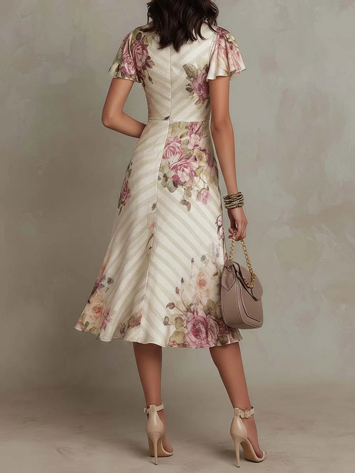 Elegant Ivory Floral Midi Dress for Women with V Neck Flutter Sleeve Ruched Wrap Flowing Style