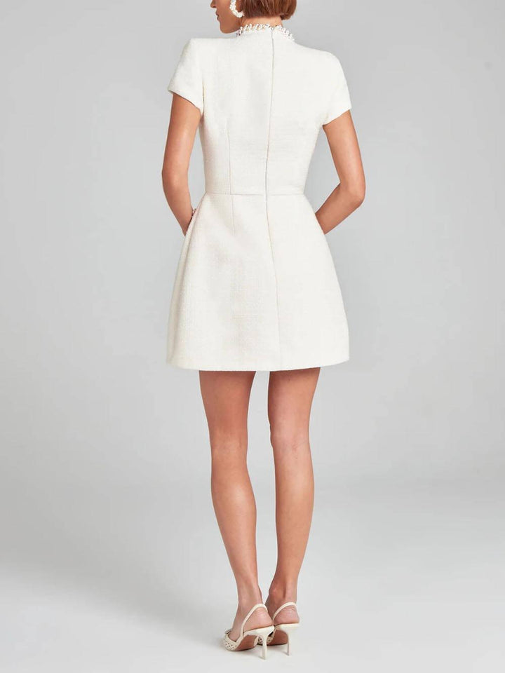 Elegant Tweed Mini Dress for Women with Mock Neck Short Sleeve Embellished Pocket Cocktail Style